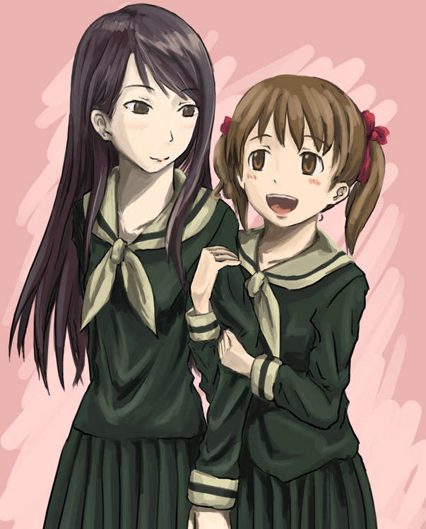 T`~
